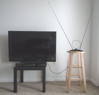 Rabbit-ear antenna with TV