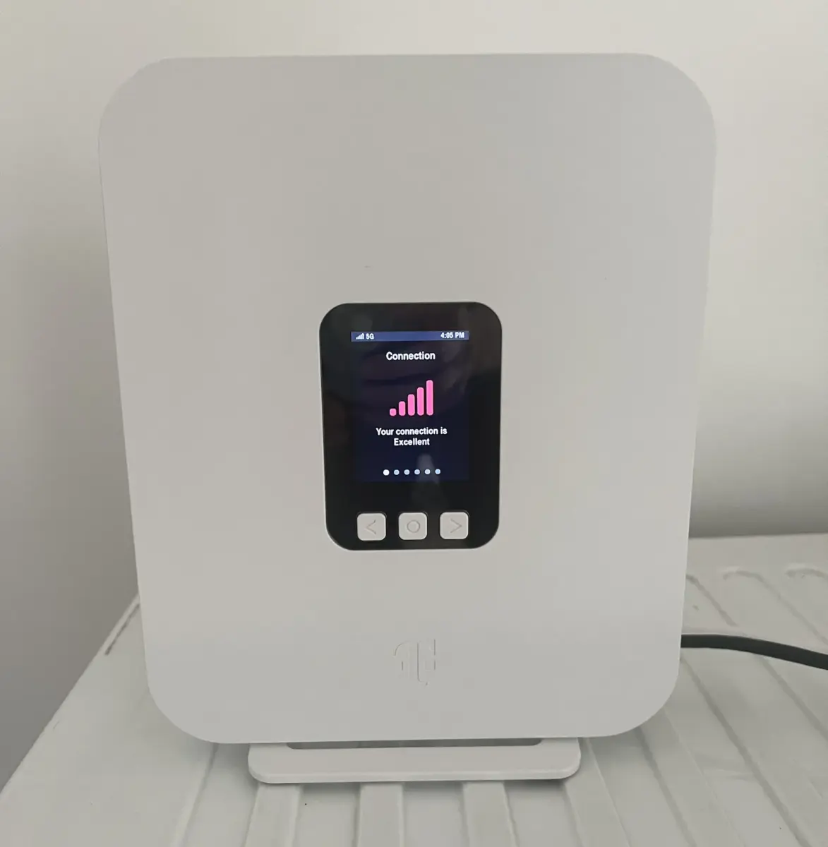 T-Mobile 5G Home Internet gateway G4AR showing display with signal strength meter
